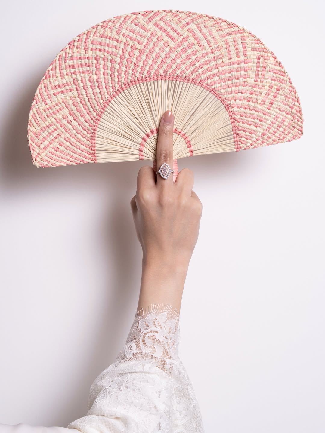 Woven fan with pink ring